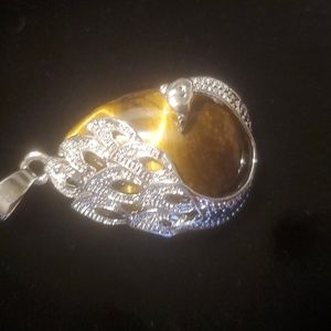 New Silver Wrapped Tigers Eye Peacock Pendant.
